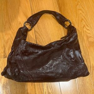 Hobo International burgundy slouchy bag.